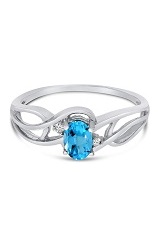 lovely white gold oval blue topaz gemstone birthstone baby ring